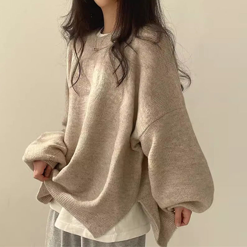 Solid-color, loose-fit, long-sleeve knit pullover with side slits