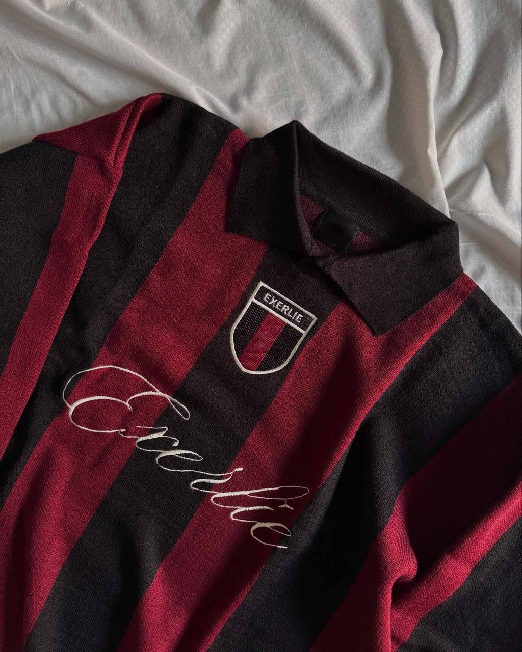 Oversized color-blocked knit sweater with letter embroidery