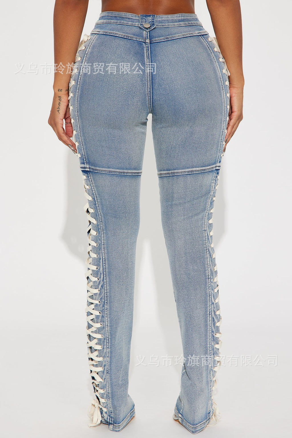 Y2K-style high-waisted, slim-fit lace-up bootcut jeans