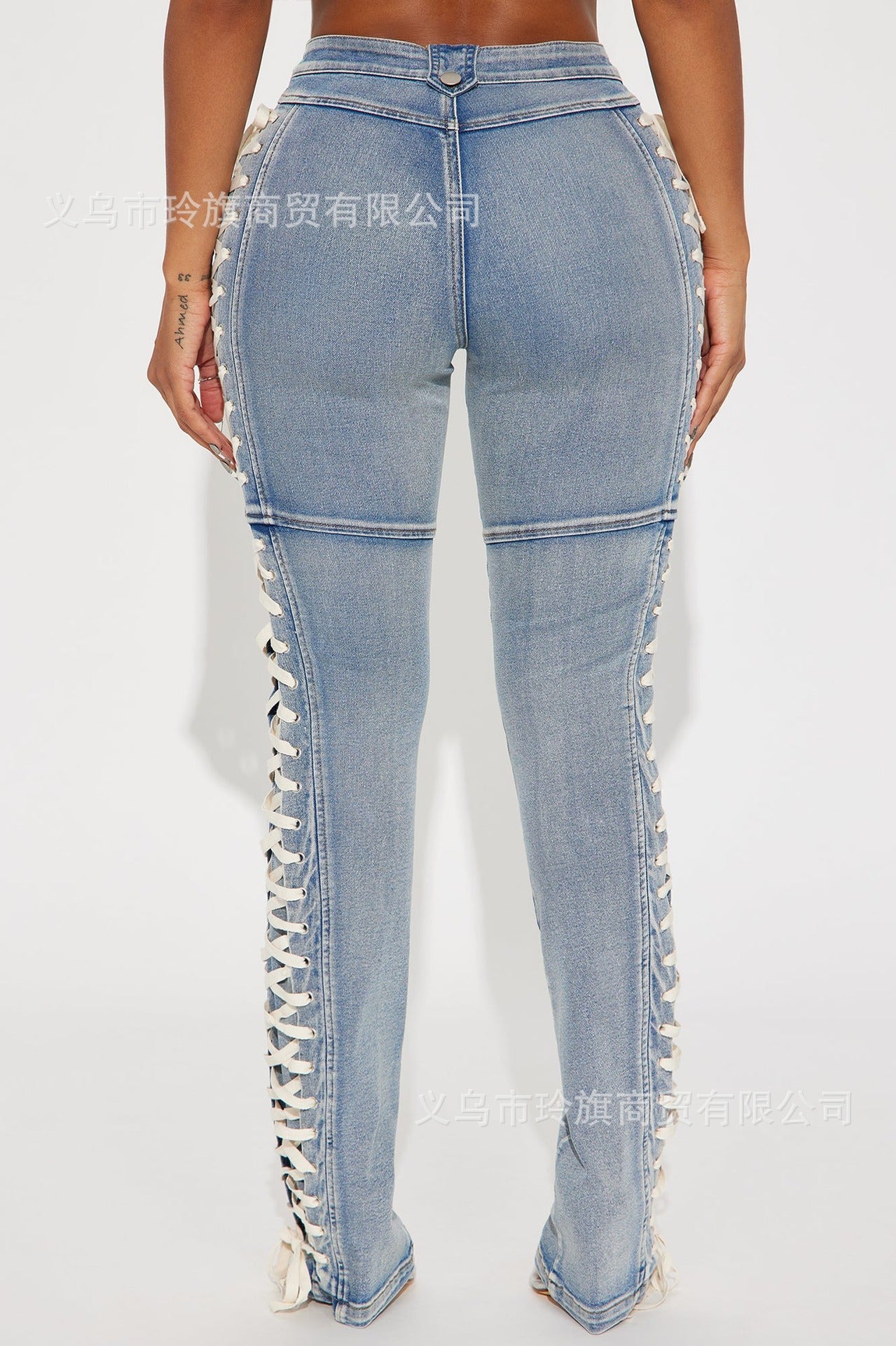 Y2K-style high-waisted, slim-fit lace-up bootcut jeans