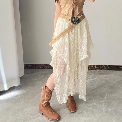 Bohemian-style high-waisted lace maxi skirt with a wavy hem.