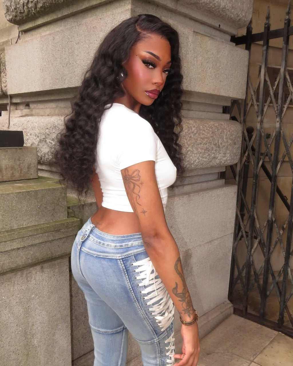 Y2K-style high-waisted, slim-fit lace-up bootcut jeans