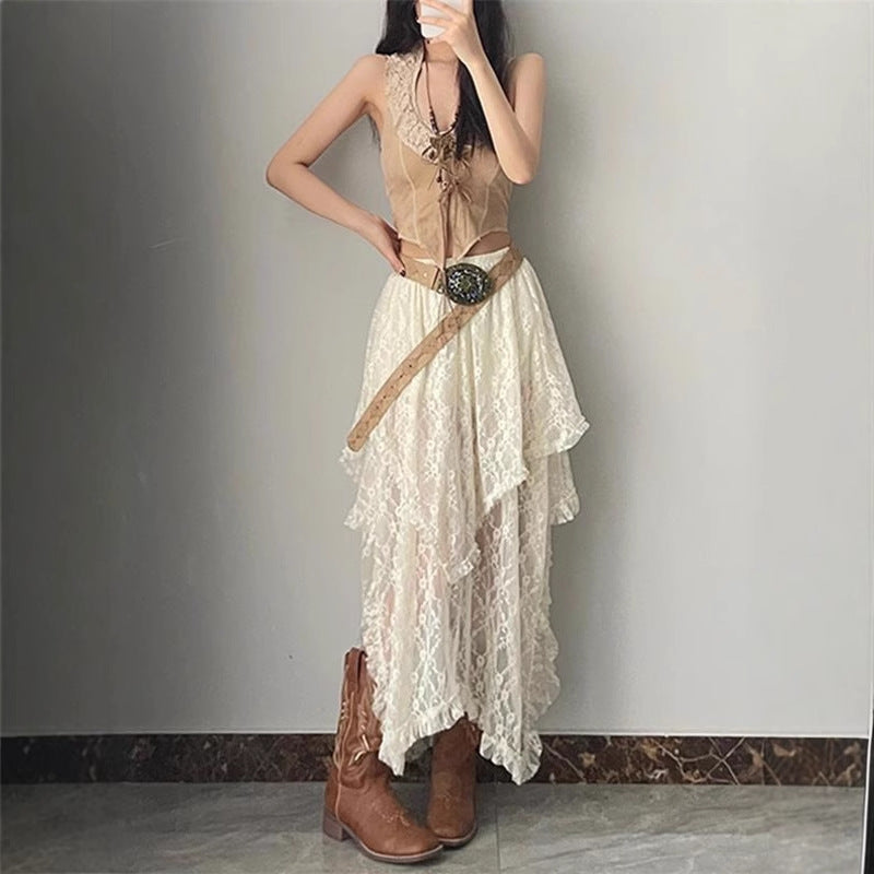 Bohemian-style high-waisted lace maxi skirt with a wavy hem.