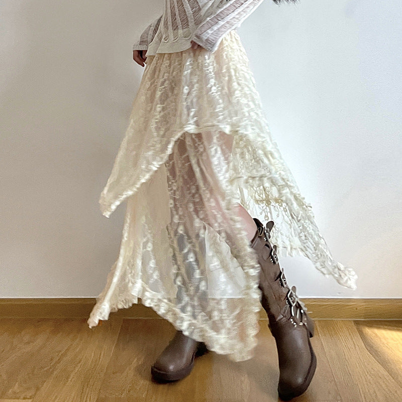 Bohemian-style high-waisted lace maxi skirt with a wavy hem.