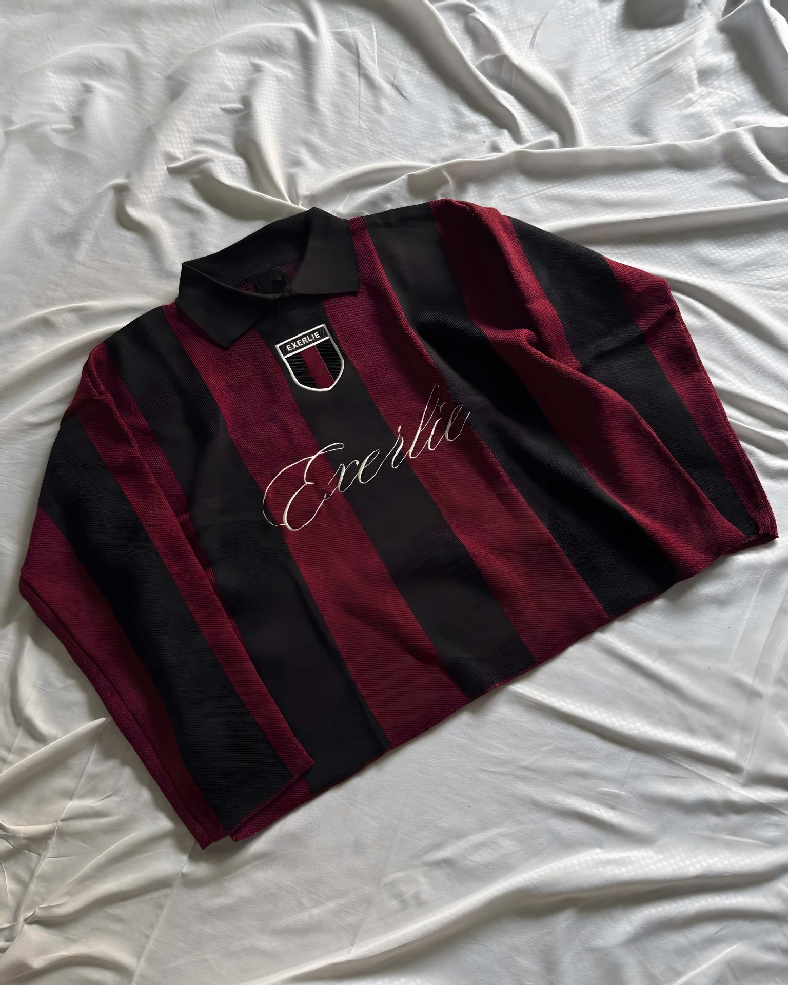 Oversized color-blocked knit sweater with letter embroidery