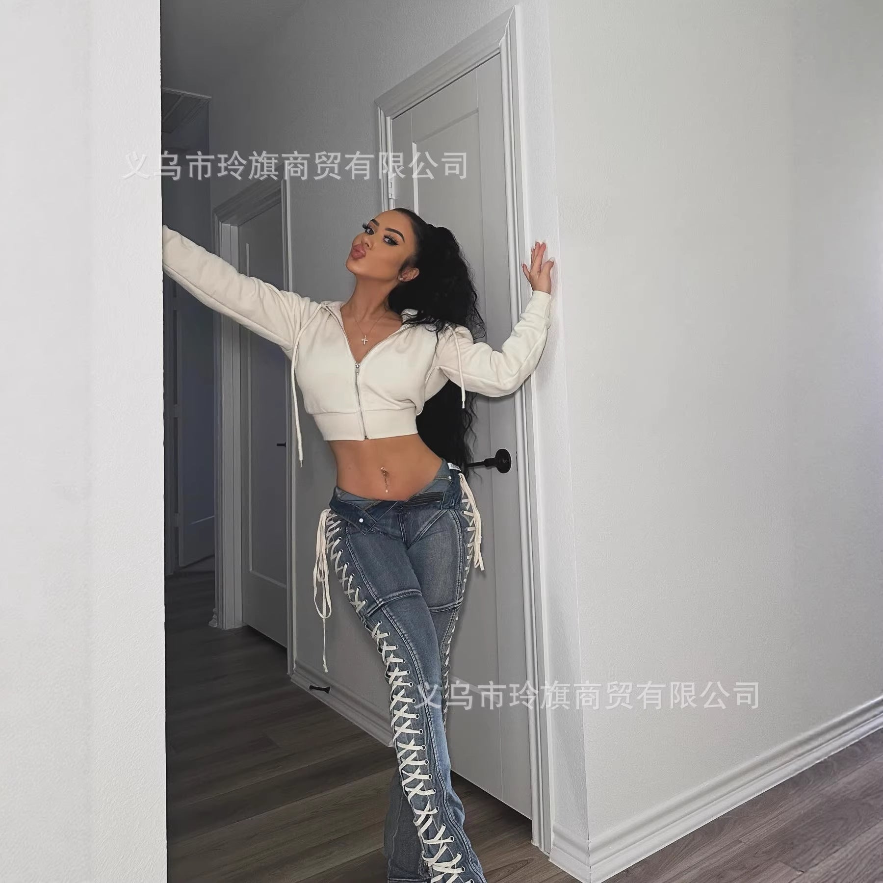 Y2K-style high-waisted, slim-fit lace-up bootcut jeans