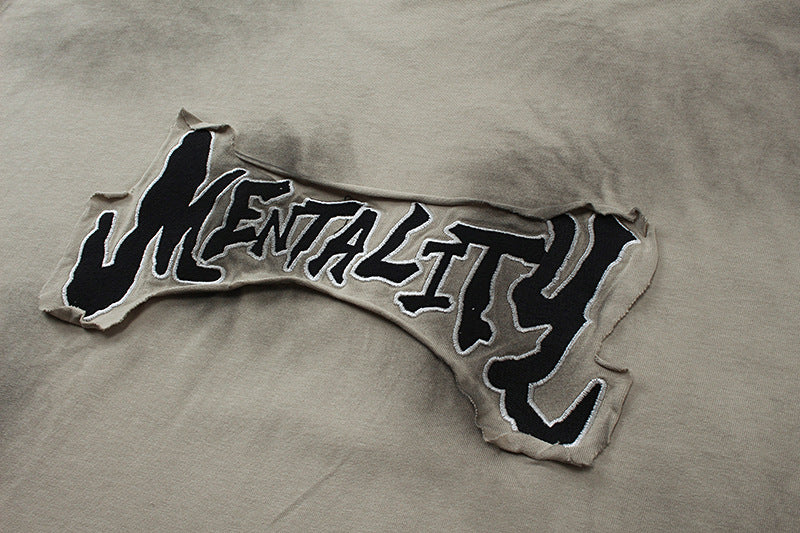 YAVIORA distressed tee with patchwork embroidery