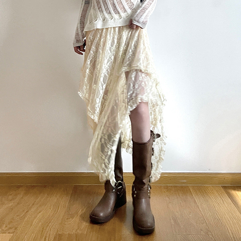 Bohemian-style high-waisted lace maxi skirt with a wavy hem.