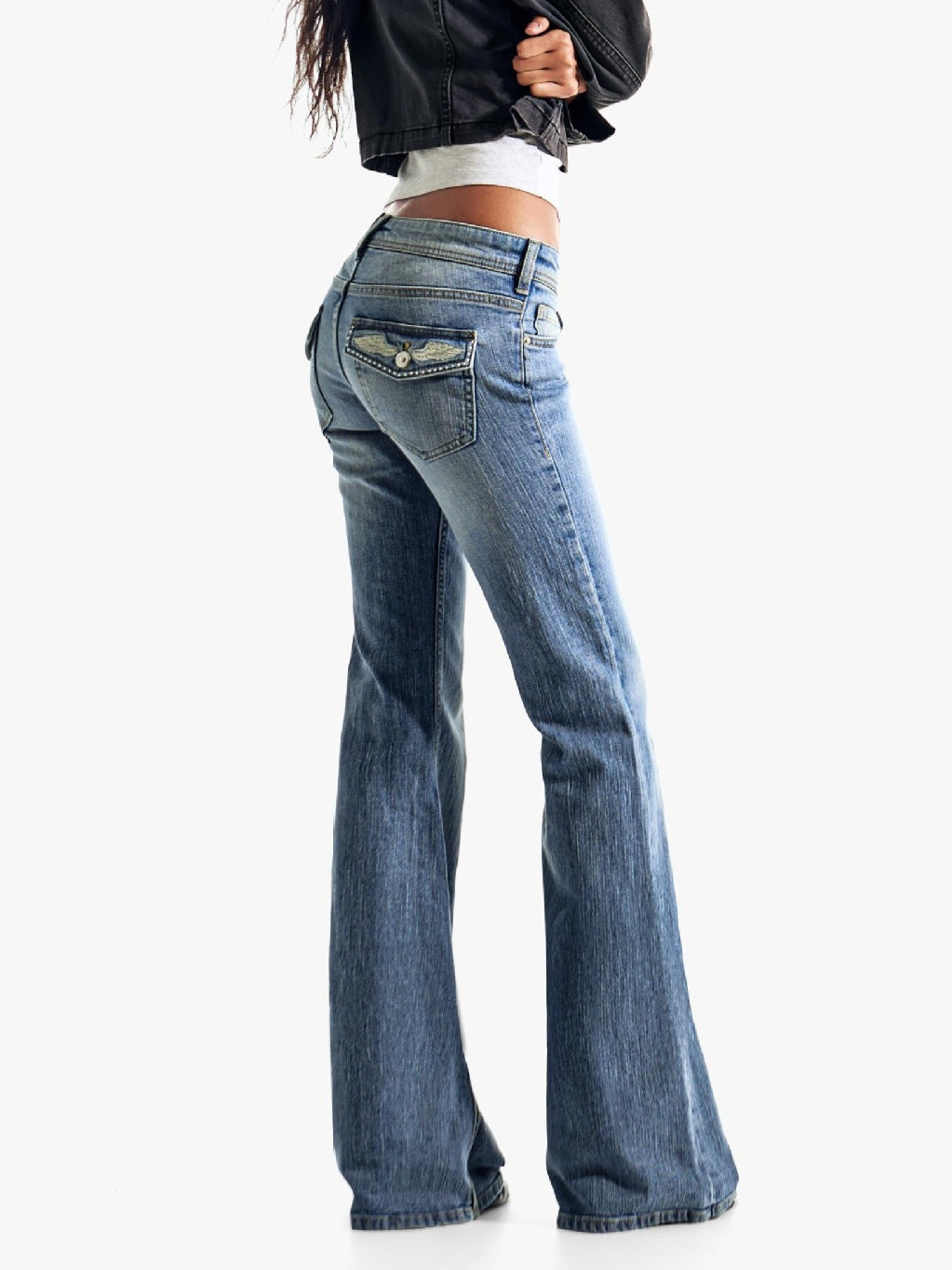 Edgy low-rise double-button denim shorts—hip-hugging hot pants.