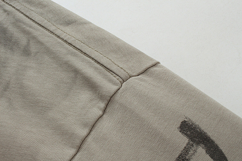 YAVIORA distressed tee with patchwork embroidery