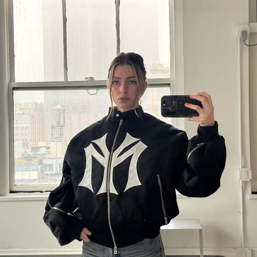 oose-fit sweatshirt with multi-zipper design and letter embroidery.