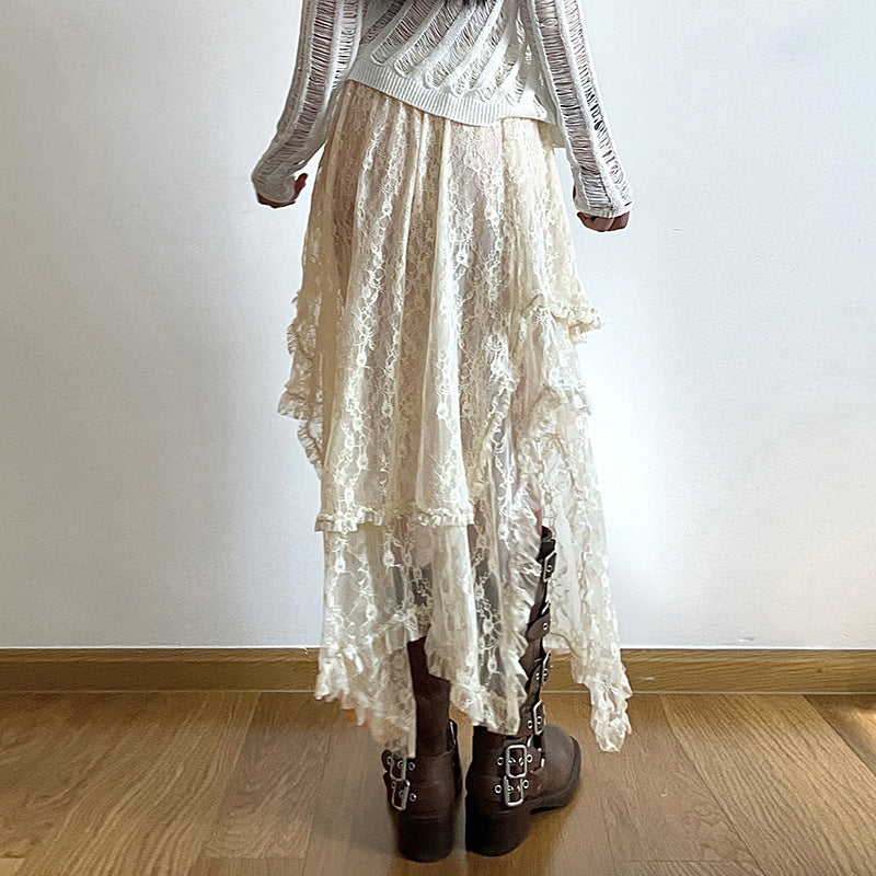 Bohemian-style high-waisted lace maxi skirt with a wavy hem.