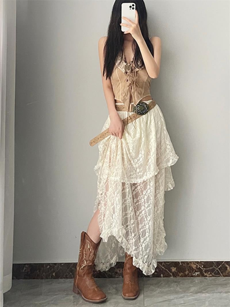 Bohemian-style high-waisted lace maxi skirt with a wavy hem.