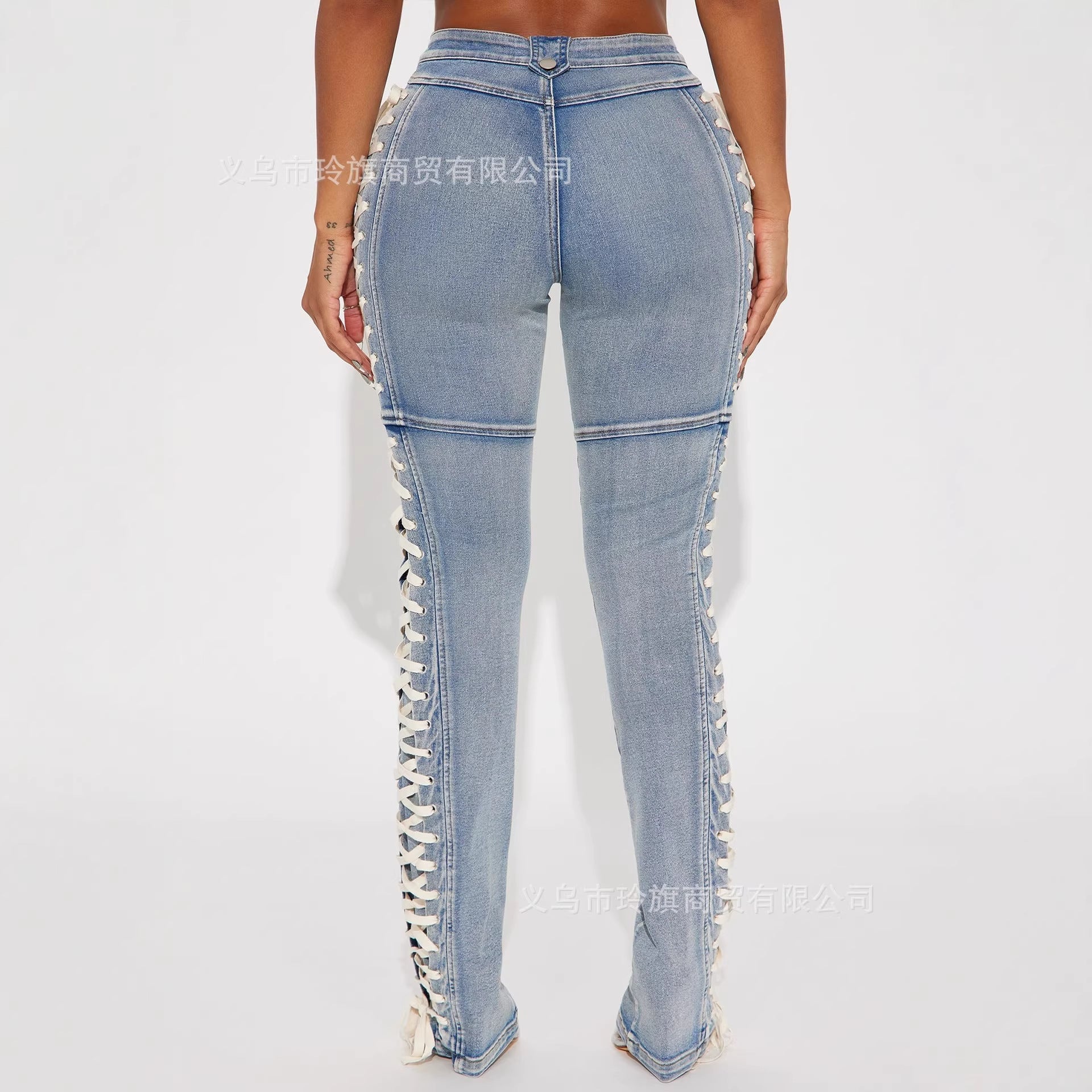 Y2K-style high-waisted, slim-fit lace-up bootcut jeans