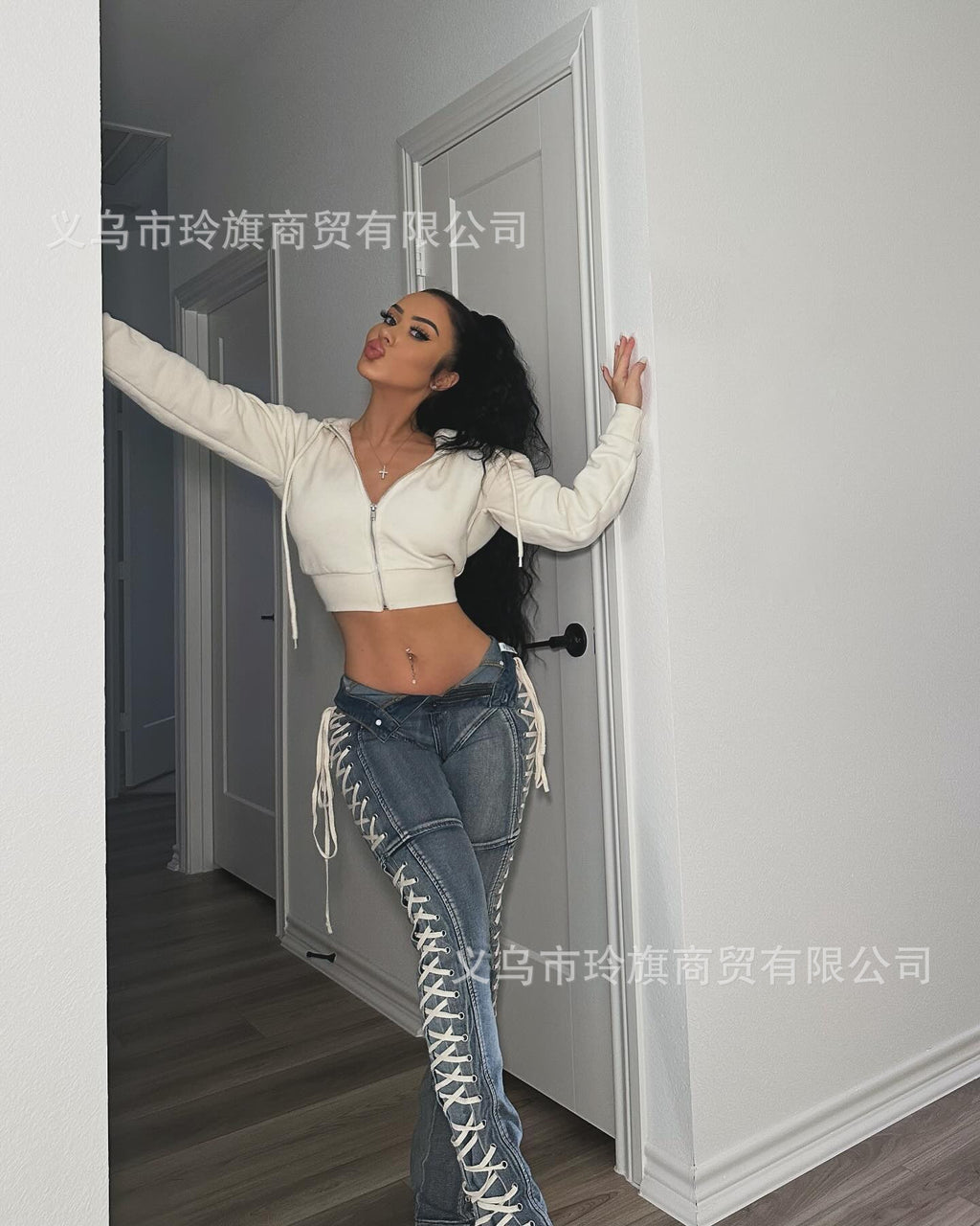 Y2K-style high-waisted, slim-fit lace-up bootcut jeans