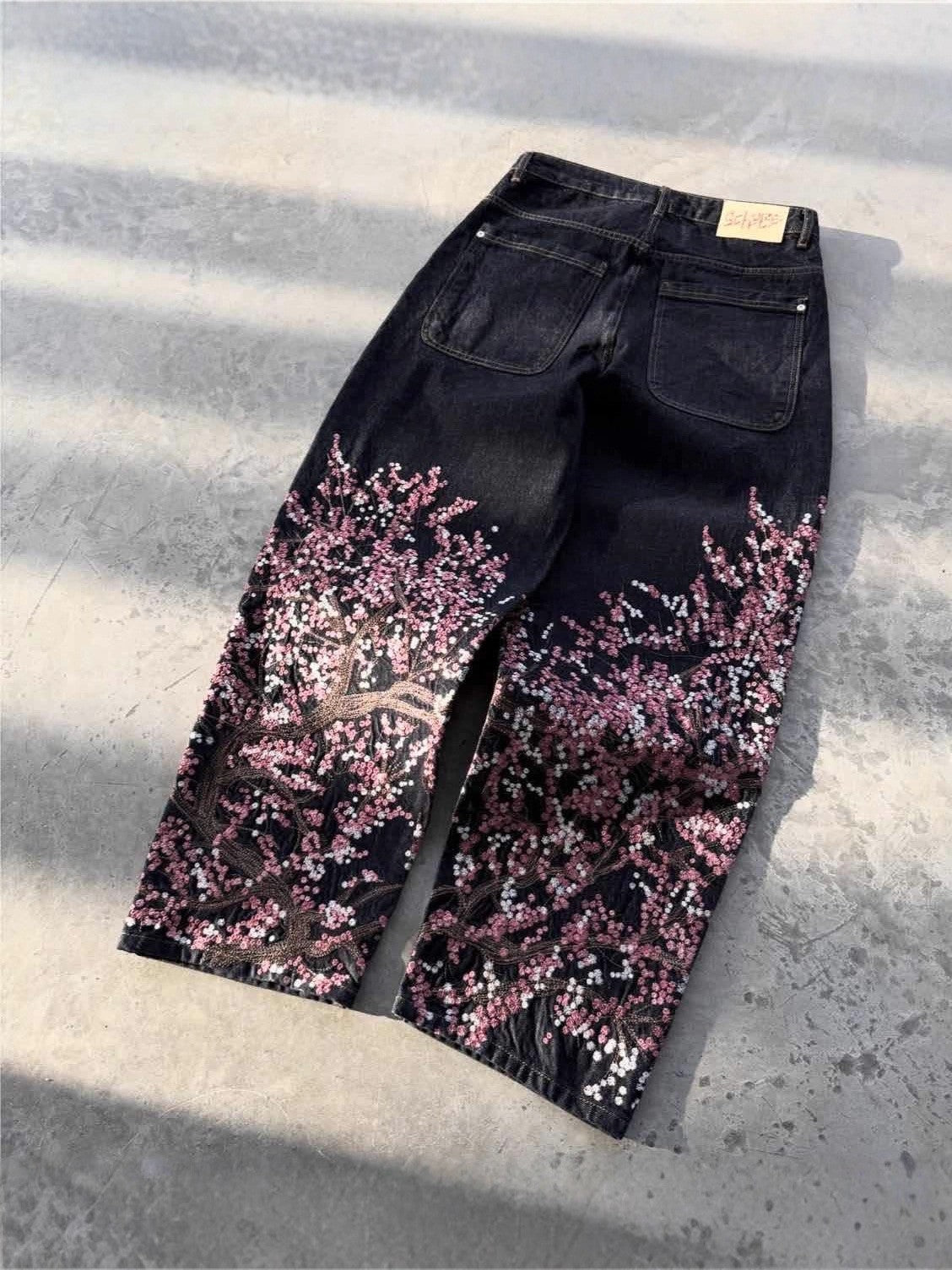 Vintage-Style Wide-Leg Jeans with Intricate Embroidery