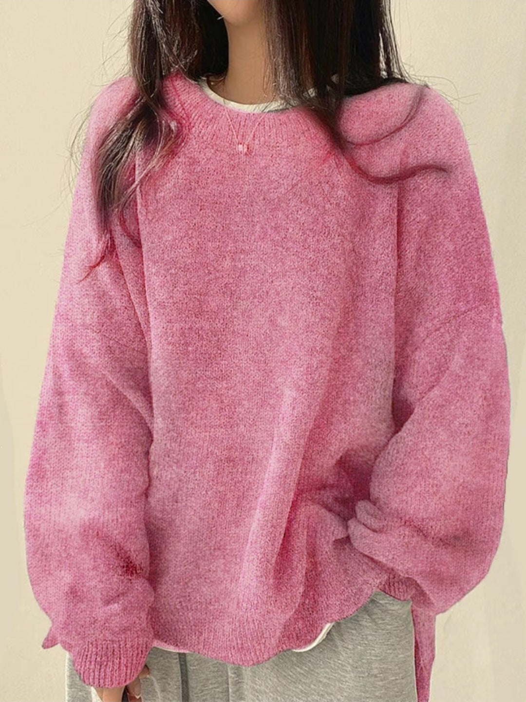 Solid-color, loose-fit, long-sleeve knit pullover with side slits